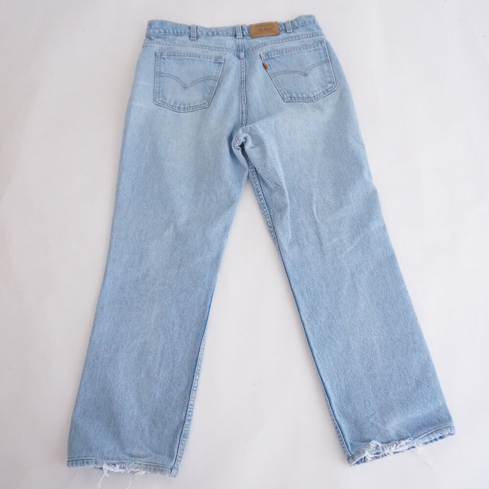 Vintage 90s' Orange Tag Levi's Light Wash Straight Leg Relaxed Denim Jeans 36